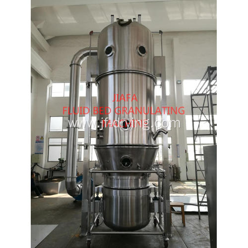 Fluid bed granulating machine